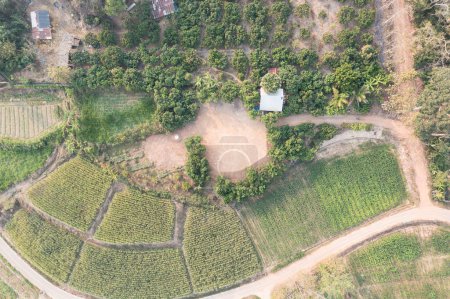 Téléchargez les photos : Land and soil backfill in aerial view. Include landscape, empty or vacant area at outdoor. Real estate or property for small plot, sale, rent, buy, purchase, mortgage and investment in Nan, Thailand. - en image libre de droit