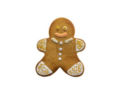 Téléchargez les photos : Biscuit homme pain d'épice décoré de glaçage royal, sucre glace isolé sur fond blanc. Nourriture de Noël, fond pâtissier. Thème Nouvel An. Joyeux Noël et Joyeuses fêtes de fin d'année - en image libre de droit