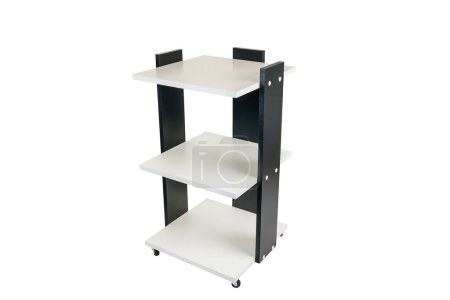 Téléchargez les photos : Cabinet or rack on wheels with shelves on a white isolated background. Combined black with white chipboard. - en image libre de droit