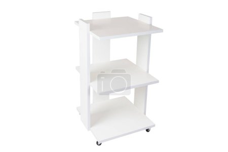 Téléchargez les photos : Cabinet or rack on wheels with shelves on a white isolated background. White chipboard. - en image libre de droit