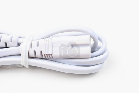 Photo for Connector from the charger for charging or powering the device on a light background with selective focus and copy space. - Royalty Free Image