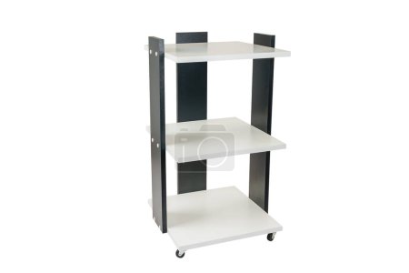 Téléchargez les photos : Cabinet or rack on wheels with shelves on a white isolated background. Combined black with white chipboard. - en image libre de droit