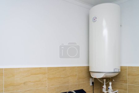 Foto de Boiler or electric water heater. Background with selective focus and copy space for text - Imagen libre de derechos