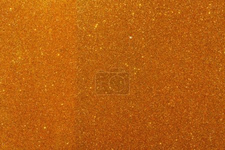Téléchargez les photos : Background with sparkles. Backdrop with glitter. Shiny textured surface. Strong orange. Soft light - en image libre de droit