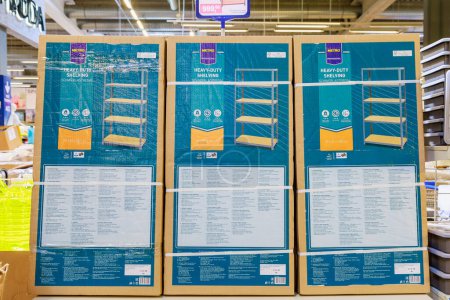 Foto de Prefabricated racks with shelves on the store shelf. Illustrative editorial. May 12, 2022 Balti Moldova - Imagen libre de derechos