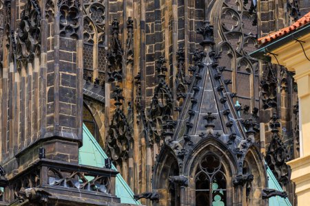 Photo for Details of the exterior of the Gothic Catholic Cathedral of St. Vitus, Wenceslas and Vojtech in Prague Castle. Background with selective focus and copy space - Royalty Free Image