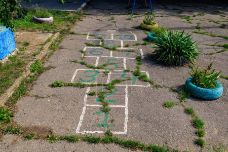 Photo for Backyard markings for hopscotch. Background with selective focus and copy space - Royalty Free Image