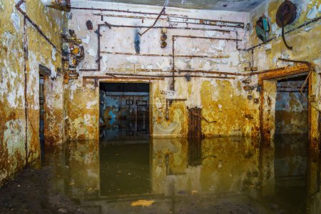 Photo for The flooded level of a secret abandoned military bunker. Background with selective focus - Royalty Free Image