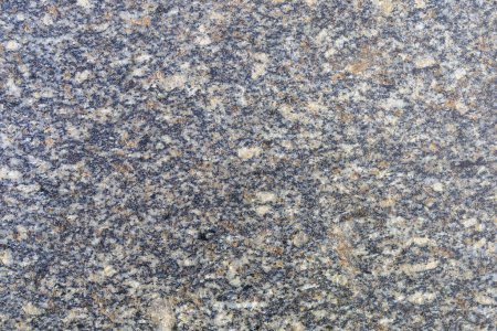 Rough textured granite countertop. Background or backdrop. Design blank or graphic resource