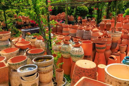 Clay products from pottery production. Background with selective focus and copy space for text
