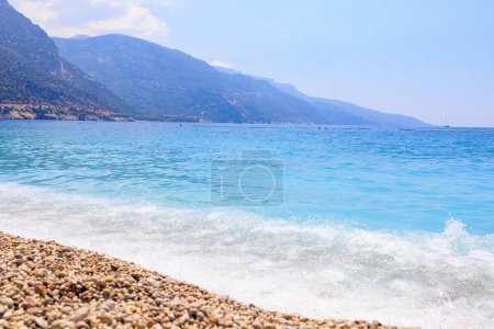 View of the mountains and the sea from Oludeniz beach, the blue lagoon. The cleanest beach with a blue flag. Background