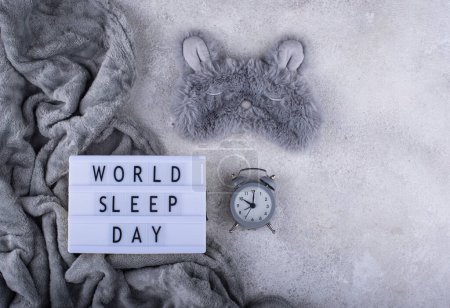 Photo for World sleep day concept with sleeping mask and alarm clock - Royalty Free Image