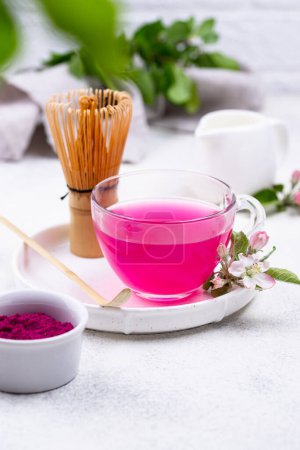 Pink matcha tea. Trendy drink from dragon fruit powder