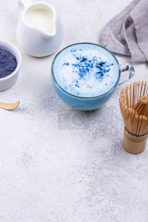 Blue matcha latte with milk. Trendy drink from Butterfly pea