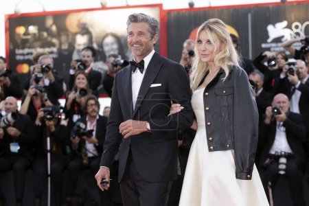 Photo for VENICE, ITALY - AUGUST 31: Patrick Dempsey and Jillian Fink attend the red carpet for the movie "Ferrari" at the 80th Venice International Film Festival on August 31, 2023 in Venice, Italy. - Royalty Free Image