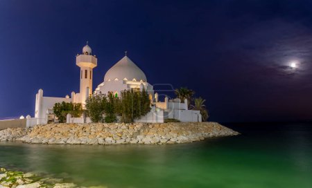 Photo for White Salem Bin Laden Mosque built on the island in the moonlight with sea in the background, Al Khobar, Saudi Arabia - Royalty Free Image