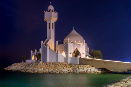 Photo for White Salem Bin Laden Mosque built on the island in the night time with sea in the background, Al Khobar, Saudi Arabia - Royalty Free Image