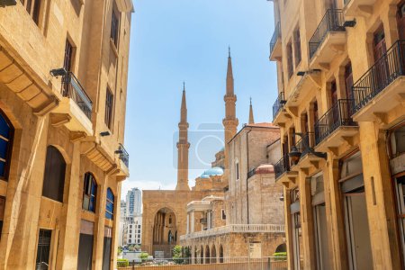 Photo for Old Beirut central downtown narrow street architecture with buildings and Al Amin mosque in the background, Lebanon - Royalty Free Image