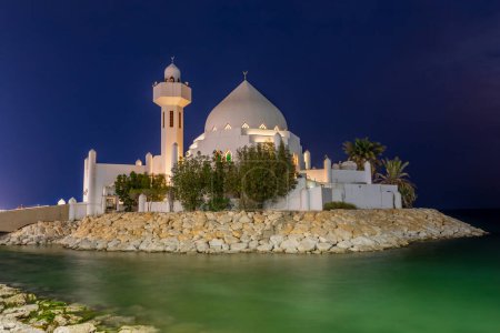 Photo for White Salem Bin Laden Mosque built on the island in the twilight surrounded by persian gulf, Al Khobar, Saudi Arabia - Royalty Free Image