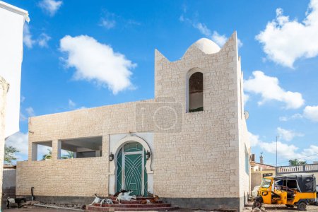 White mosque on the street of Tajoura with goats at the entrance, Tajourah region, Djibouti, Horn of Africa