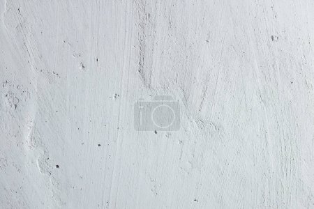 Foto de Pared con grietas. textura de cemento de hormigón ligero con arañazos, fondo para espacio de copia - Imagen libre de derechos
