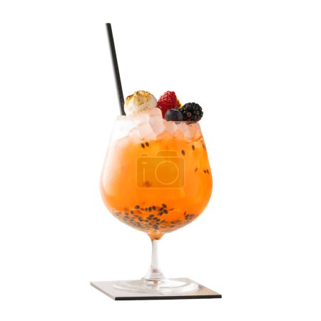 Photo for An exotic cocktail featuring vibrant passion fruit juice, boba pearls, and a garnish of toasted marshmallow, fresh raspberries, and blackberries, served in a stylish glass with a black straw. - Royalty Free Image