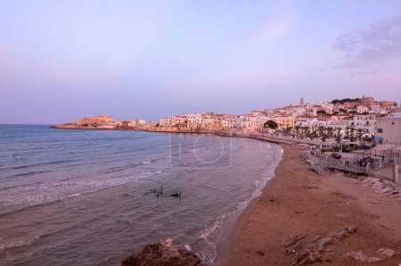 Photo for Vieste, Foggia, Italy 29 June 2021 View over historic old town on blue hour at Vieste, Gargano, Apulia, Italy - Royalty Free Image