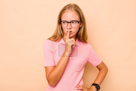 Photo for Caucasian teen girl isolated on beige background keeping a secret or asking for silence. - Royalty Free Image