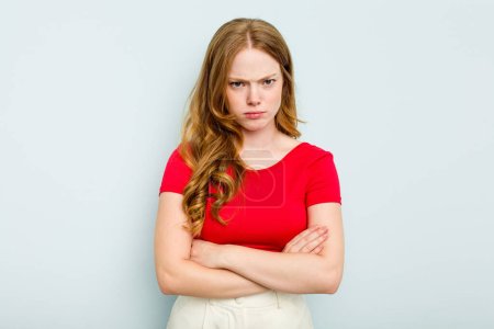 Photo for Young caucasian woman isolated on blue background unhappy looking in camera with sarcastic expression. - Royalty Free Image