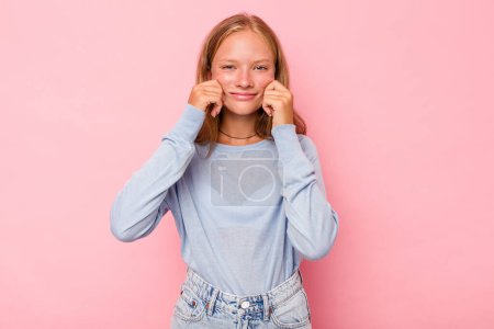 Photo for Caucasian teen girl isolated on pink background doubting between two options. - Royalty Free Image