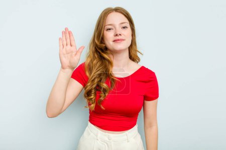 Photo for Young caucasian woman isolated on blue background smiling cheerful showing number five with fingers. - Royalty Free Image
