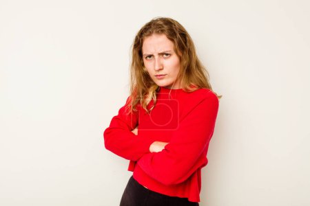 Photo for Young caucasian woman isolated on white background frowning face in displeasure, keeps arms folded. - Royalty Free Image