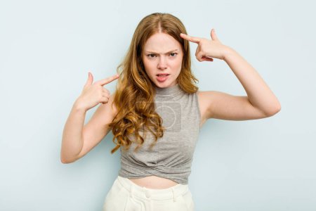 Photo for Young caucasian woman isolated on blue background showing a disappointment gesture with forefinger. - Royalty Free Image