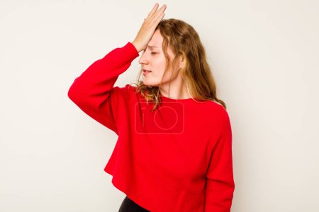 Photo for Young caucasian woman isolated on white background forgetting something, slapping forehead with palm and closing eyes. - Royalty Free Image