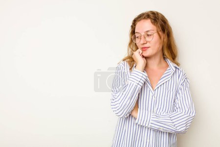 Photo for Young caucasian woman isolated on white background looking sideways with doubtful and skeptical expression. - Royalty Free Image