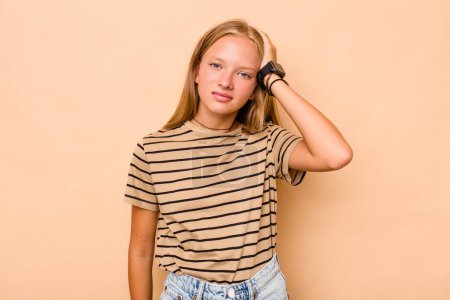 Photo for Caucasian teen girl isolated on beige background being shocked, she has remembered important meeting. - Royalty Free Image