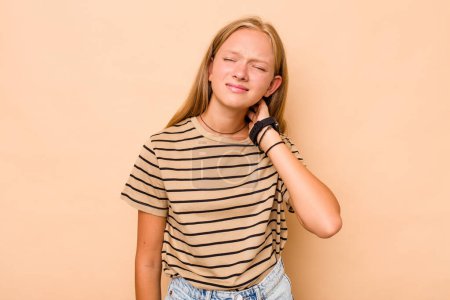 Photo for Caucasian teen girl isolated on beige background suffering neck pain due to sedentary lifestyle. - Royalty Free Image