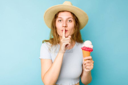 Photo for Young caucasian woman holding an ice cream isolated a blue background keeping a secret or asking for silence. - Royalty Free Image