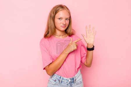 Photo for Caucasian teen girl isolated on pink background smiling cheerful showing number five with fingers. - Royalty Free Image
