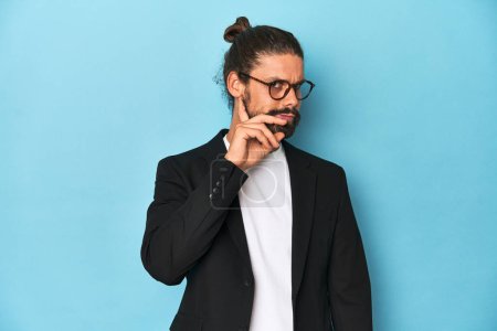 Photo for Businessman in suit with eyeglasses and beard trying to listening a gossip. - Royalty Free Image