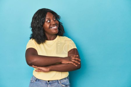 Photo for Young african american curvy woman smiling confident with crossed arms. - Royalty Free Image