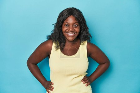 Photo for Young african american curvy woman confident keeping hands on hips. - Royalty Free Image