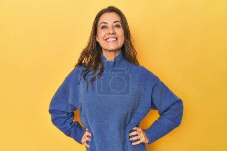 Photo for Portrait of beautiful adult woman confident keeping hands on hips. - Royalty Free Image