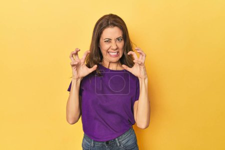 Photo for Portrait of beautiful adult woman upset screaming with tense hands. - Royalty Free Image