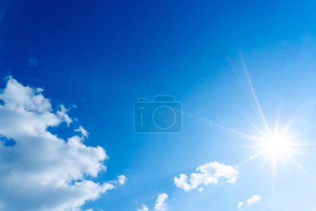 Photo for The blue summer sky with white fluffy clouds - Royalty Free Image