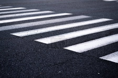 Photo for Crosswalk of pedestrian road background with black color. - Royalty Free Image