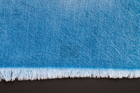 Foto de Detalle de bonita textura textil vaqueros azules para fondo con tono vintage. - Imagen libre de derechos