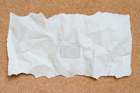 Photo for Empty paper sheet with white texture and green masking tape on brown cork board surface. Copy space for add text or art work designs. - Royalty Free Image
