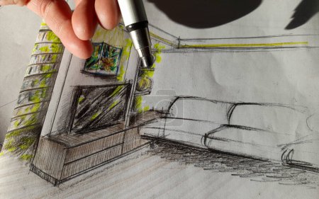 Foto de Architect designing a living room and new furniture with his pencil - Imagen libre de derechos