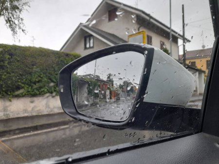 Driving in the rain in winter - rear view mirror